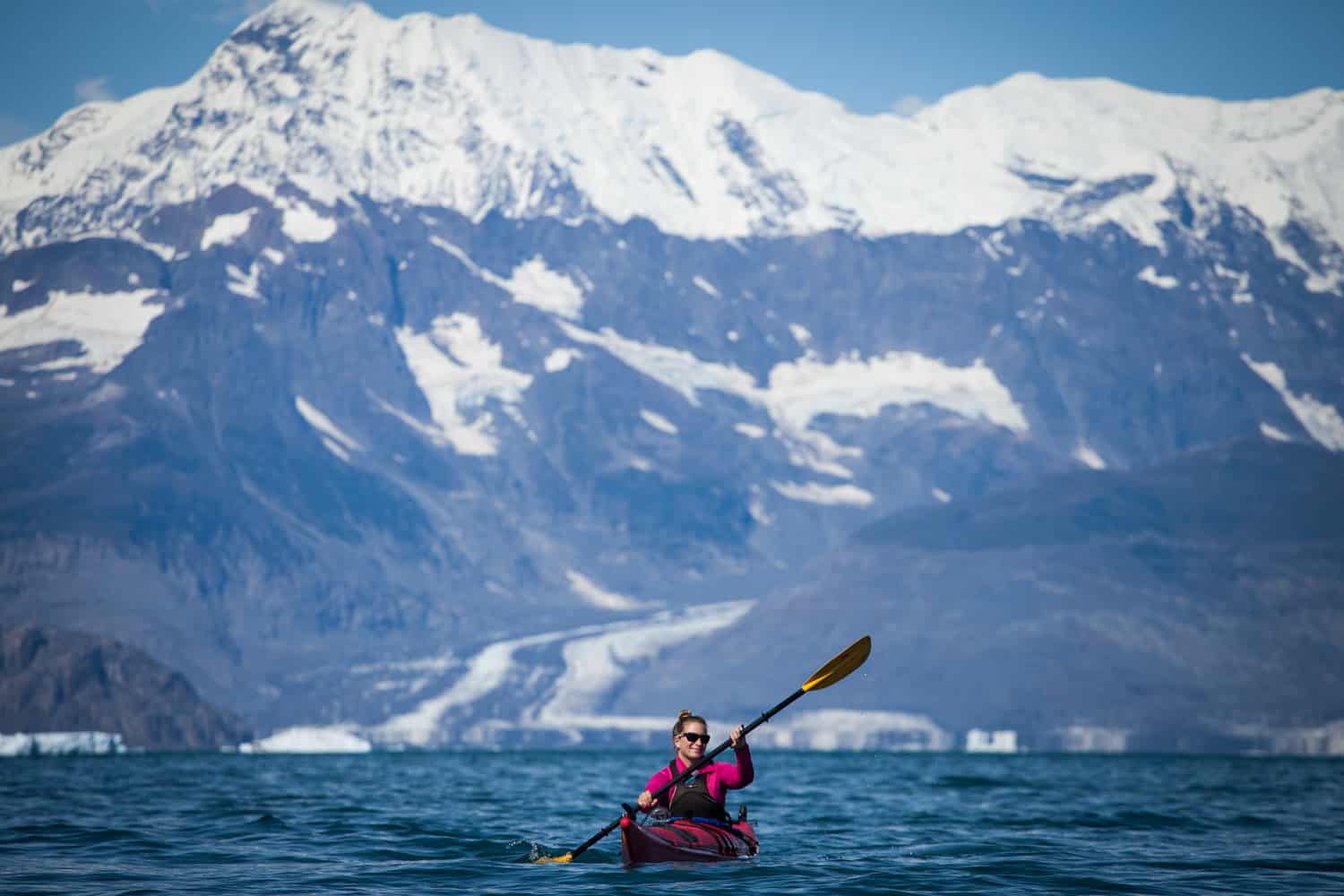 Laurel Winterbourne and Trevor Clark sea kayaking in Prince William Sound around Columbia Glacier. Valdez, Alaska.