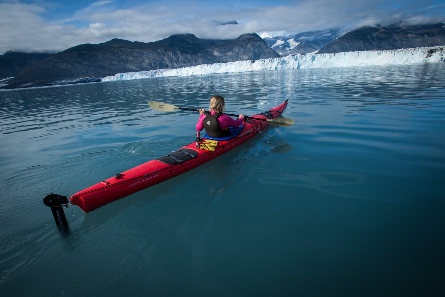 Laurel Winterbourne and Trevor Clark sea kayaking in Prince William Sound around Columbia Glacier. Valdez, Alaska.